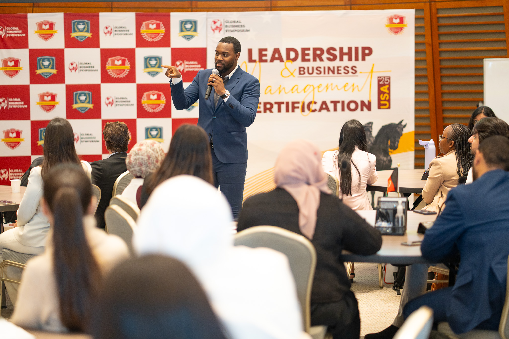 Trevón Gross Jr. speaking and teaching in front of a leadership audience